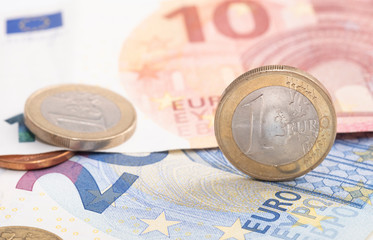 Euro money, coins and banknotes, the focus on the coin