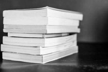 selecting which books to keep and which to discard or donate, decluttering concept
