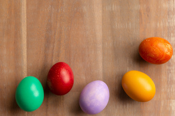 Fototapeta na wymiar Top view of colorful easter eggs