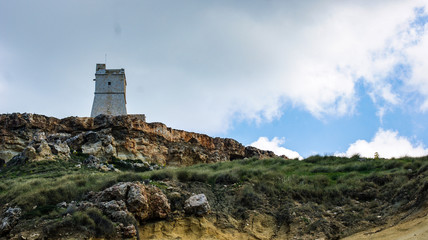 Fototapeta na wymiar The watch tower on the hill