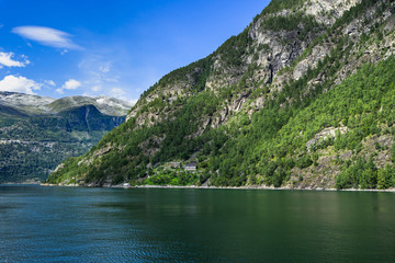 Fototapeta premium Idyllic natural landscape of the Geirangerfjord, a popular destination in Norway for cruise ships