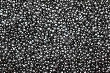 The pile of metal pellet for parts polishing process. The texture of pellet of metal.