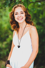 Redhead girl in the park.
