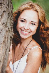 Redhead girl in the park.