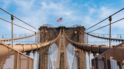 Fototapeta premium Brooklyn Bridge with American Flag