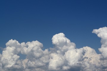 marvellous toned light clouds in the sky for using in design as background.