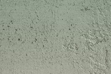 creative aged orange travertine like plaster texture for use as background.