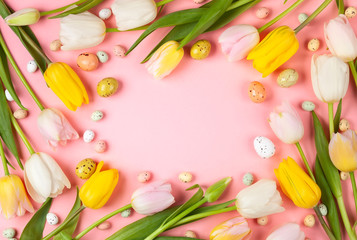 Fototapeta na wymiar Beautiful white, pink and yellow tulips flowers for Easter.