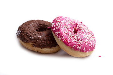 Donuts on a white background, two multi-colored donuts.