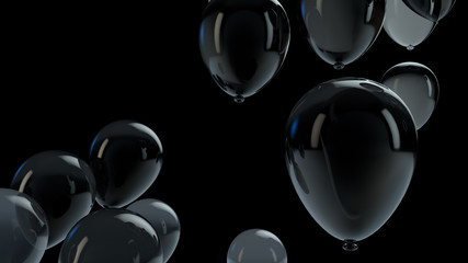 Black balloon floating in the air