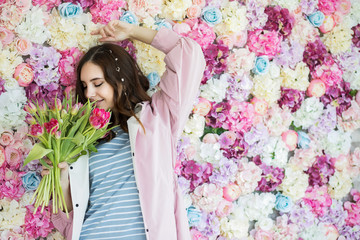 Girl with a bouquet of tulips