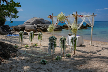 romantic wedding ceremony on the paradise tropical beach on Koh Tao, Thailand