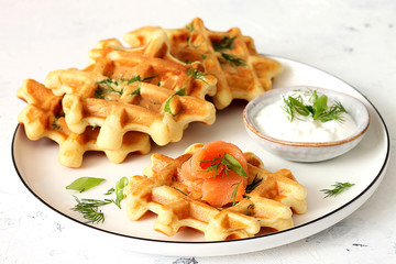 Waffles with fresh herbs and salmon