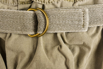 clothing items washed cotton fabric texture with seams, clasps, buttons and rivets