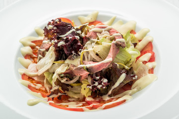 meat salad with vegetable and sesame. spanish kitchen