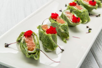 Salmon bread roll with cheese. Spinach and Salmon Pancakes