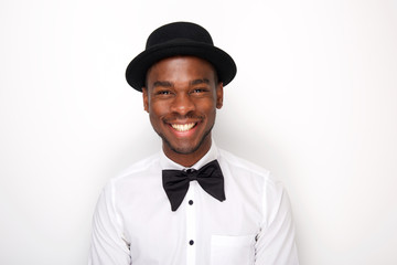 Close up cool african american man smiling with bowtie and hat