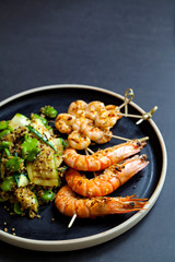 Grilled tiger prawns and courgette and quinoa salad