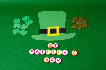 Paper Saint Patrick's day leprechaun props: green leprechaun hat, orange beard with mustache, coins...