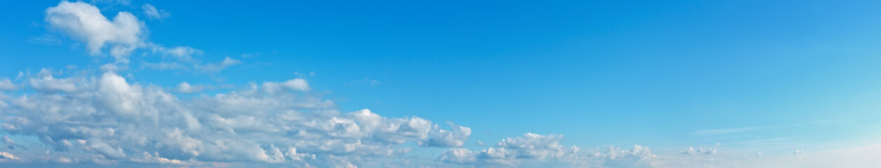 Blue sky background with clouds