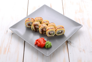 Fried sushi roll with eel and japanese omelette