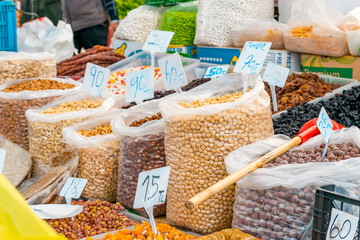 Sale of a variety of nuts in thr plastic bags at the east bazaar