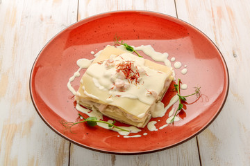 seafood lasagna with salmon and white sauce