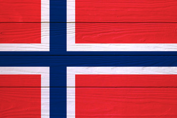 Fototapeta premium flag of Norway on wooden background