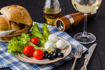 appetizer with fresh tomatoes and mozzarella and bread