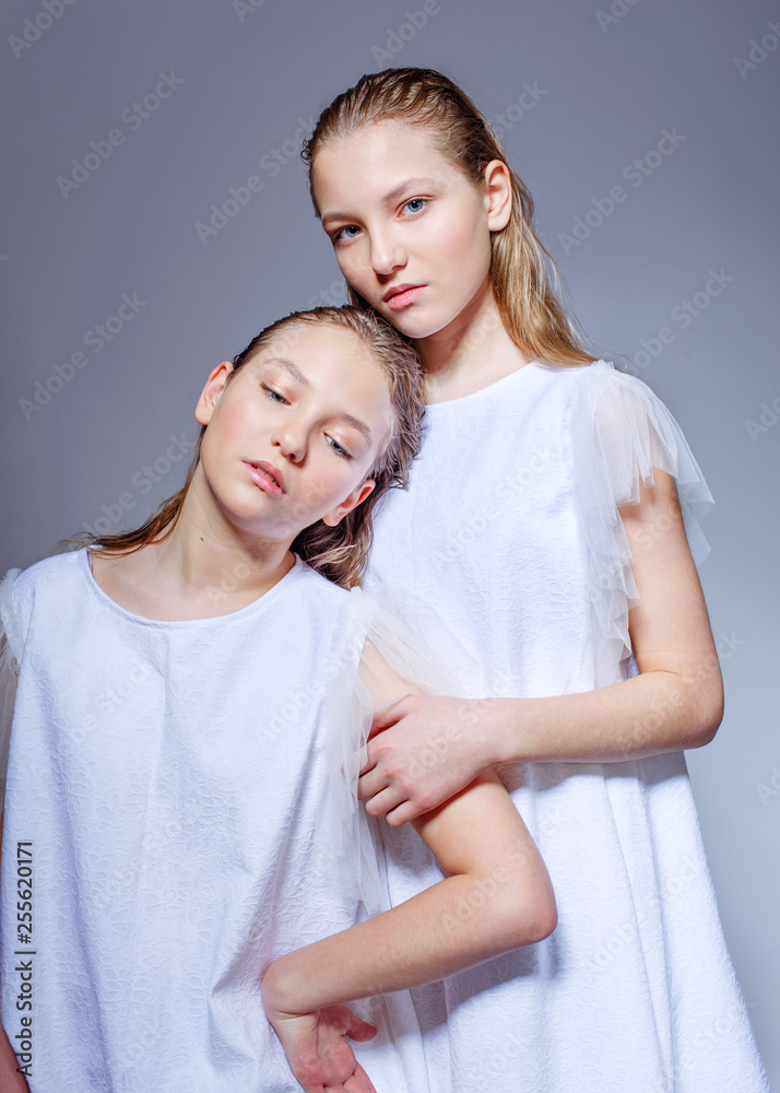 Sticker portrait of little model girl in studio