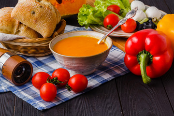 traditional warming pumpkin soup, homemade with bread and antipasti