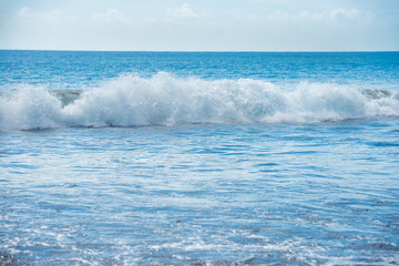 Naklejka na ściany i meble Seascape with wave on foreground