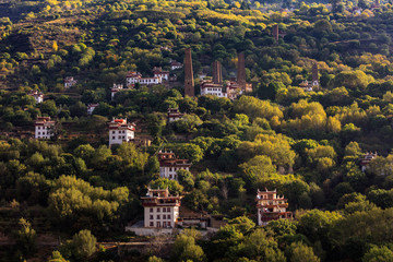 Danba County, Sichuan Province China. Zhonglu Township, Architectural Style of Jiuaju Ancient Tibetan Village. Traditional Tibetan buildings, Suopo towers, beautiful Chinese countryside. Wild West