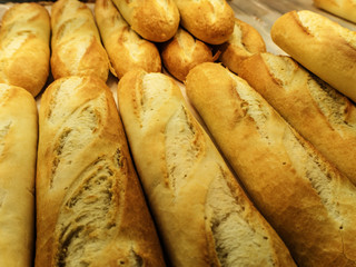 Fresh tasty loaves on the counter in the store
