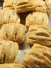 Delicious fresh pastries with jam on the counter in the store