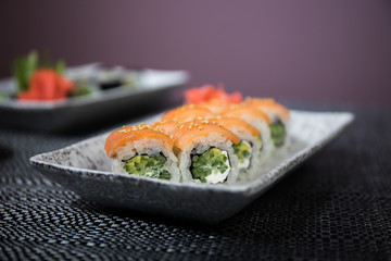 Japanese sushi set with ready to serve. Beautiful eastern style table decoration with sushi.