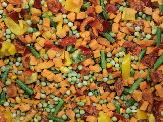 Frozen vegetable mix in a fridge in the store
