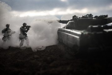War Concept. Military silhouettes fighting scene on war fog sky background, World War Soldiers...