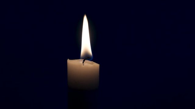 Using snuffle to put out candle in dark room