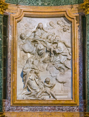 Bas relief in the Altieri chapel in the Church of Santa Maria in Portico in Campitelli in Rome, Italy.