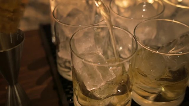 Alcoholic beverage being served on the rocks.