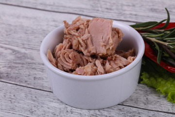 Tasty canned tuna fish in the bowl