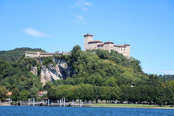 Naklejka premium Rocca d'Angera in Angera view from Arona at Lake Maggiore, Italy