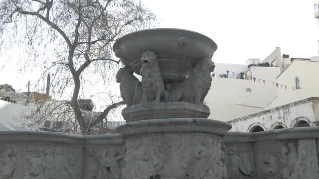 Morosini Lions Fountain in the square of the city center of Heraklion Crete in Greece. Famous Venetian fountain with four lions with water gushing from their mouths.