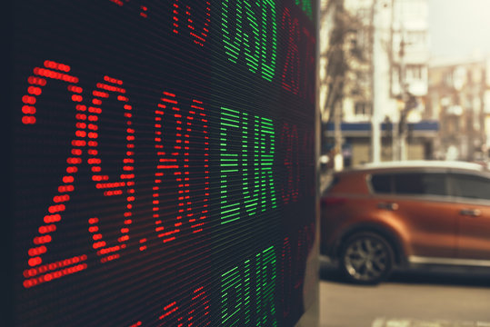 exchange rate on a street exchange board - Powered by Adobe