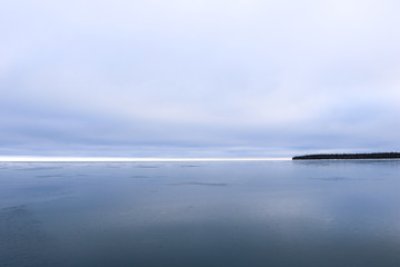 Island on Frozen Lake