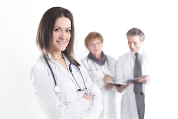 Fototapeta premium confident female doctor therapist on blurred background of colleagues