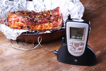 Grilled Steak in a pan and Wireless Remote Digital Cooking Food Probe Meat Thermometer For Grill on...