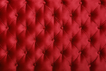 Red capitone tufted fabric upholstery texture
