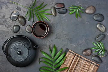 Tea composition with ceramic tea cups and black  teapot